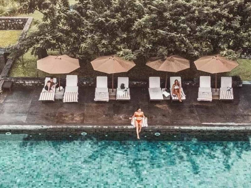 Enjoying the pool at an eco-friendly luxury resort